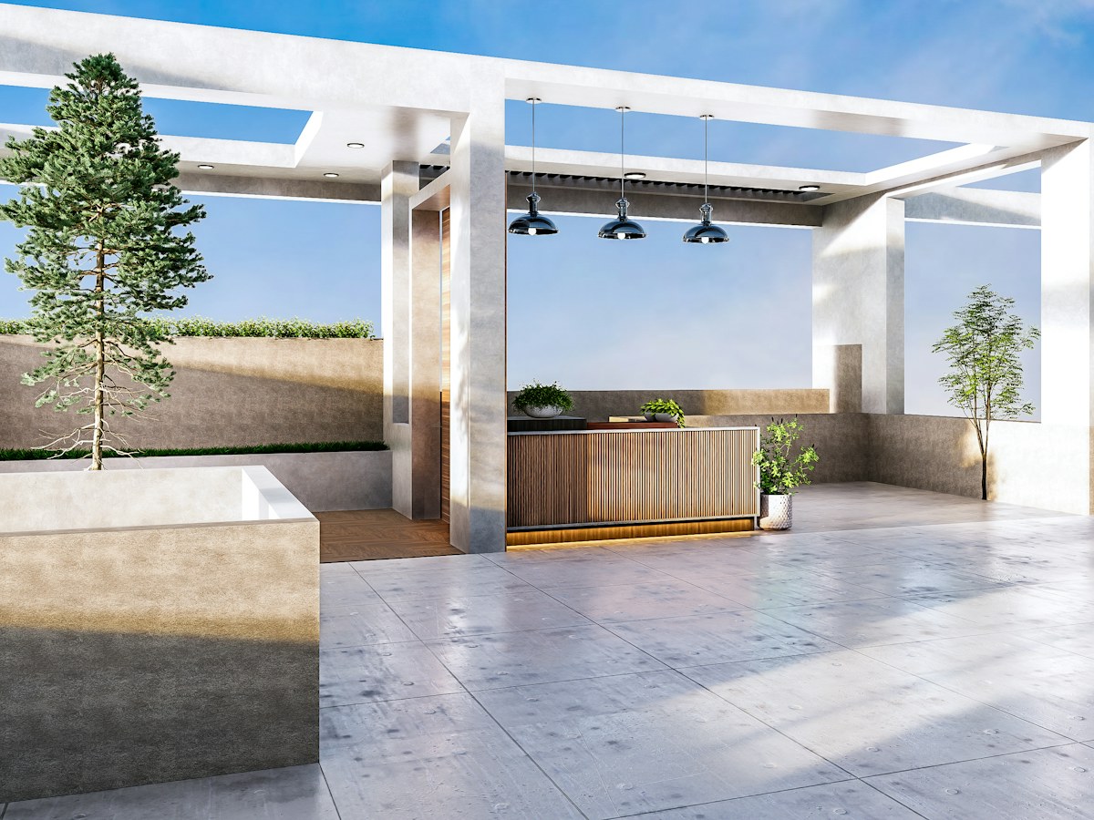 Covered outdoor living space with a stone hearth